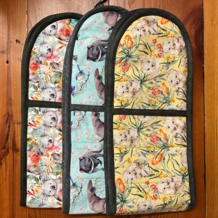 Three Australiana double oven mitts in koala, Tasmanian devil and wombat fabrics
